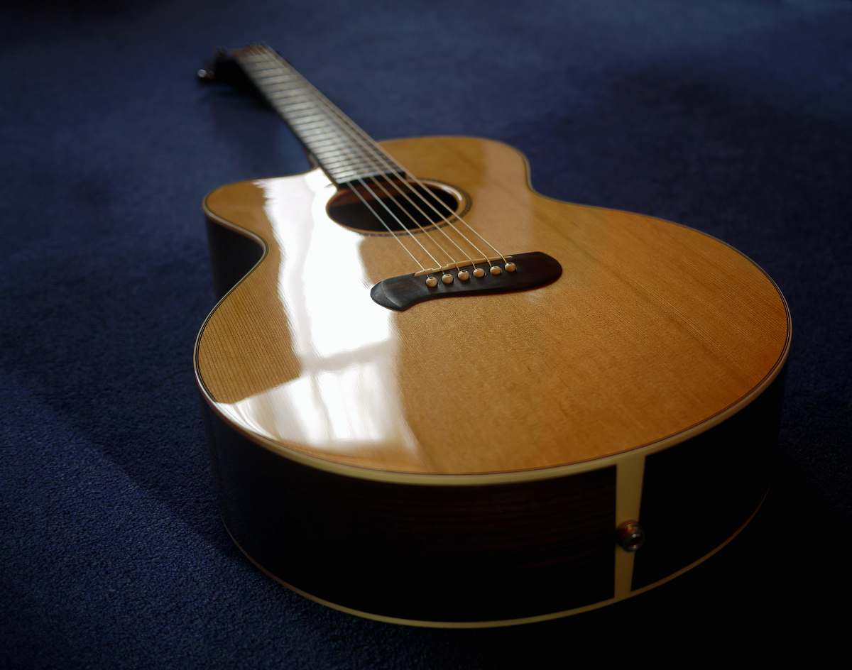 leisure activities brown single-cutaway acoustic guitar musical instrument